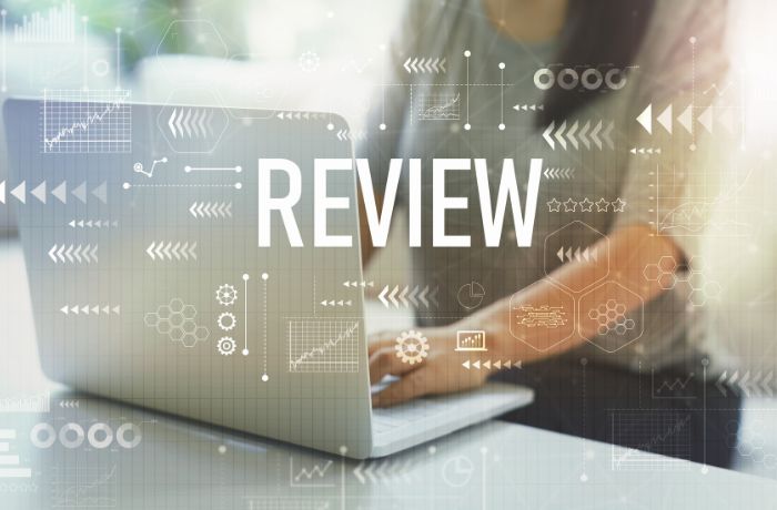 A woman writing reviews