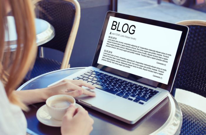 Blog concept, woman blogger writing online
