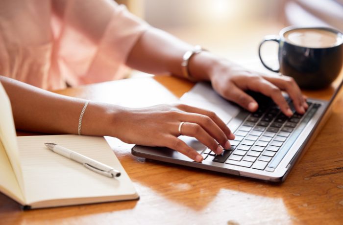 Laptop, typing, and woman hands writing content