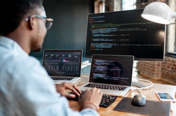 Programmer working with program code