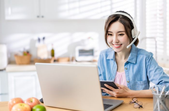Woman Having a Video Meeting at Home